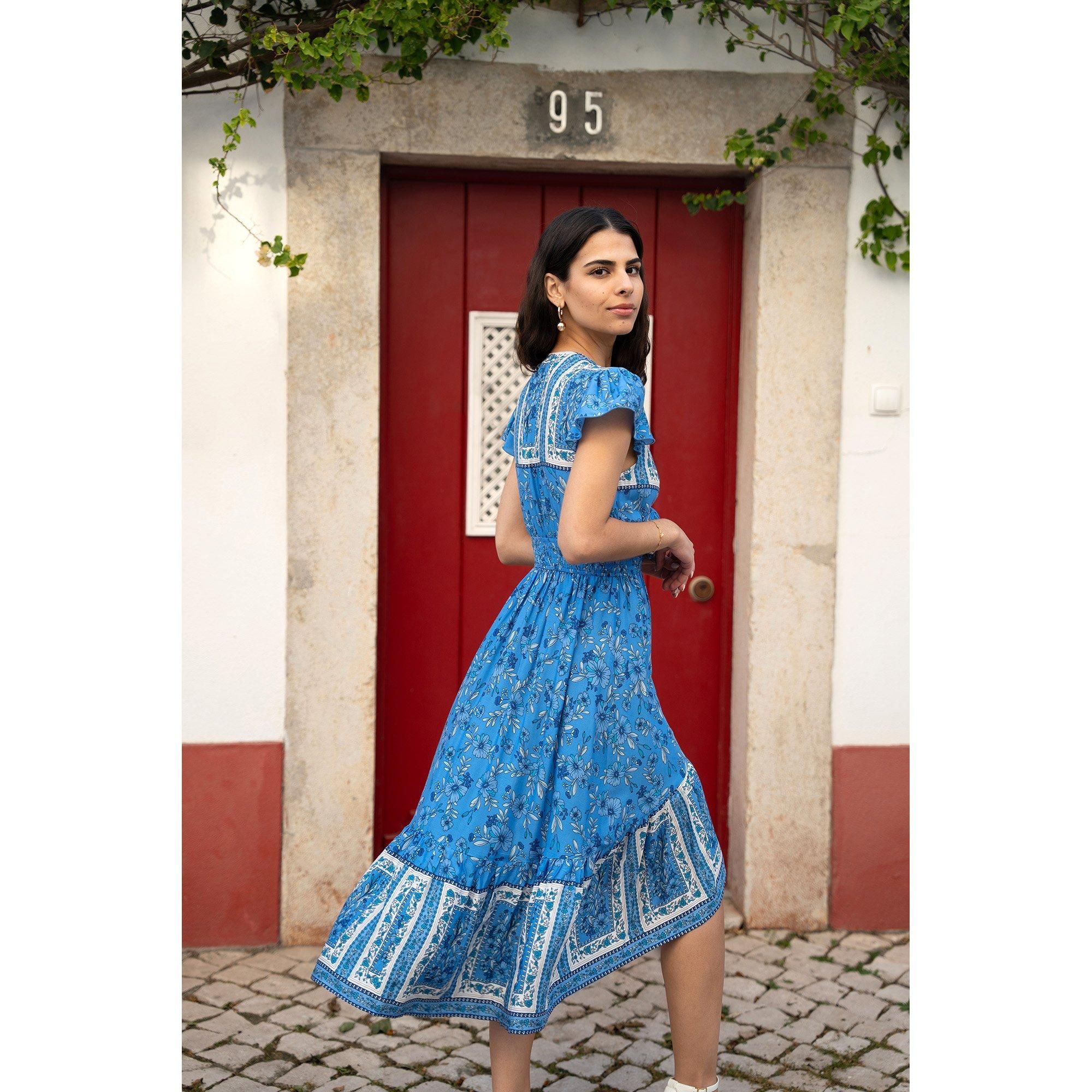 Blue Ditsy Print Sun Dress With Cross Over Back Tie Front And Dip Hem